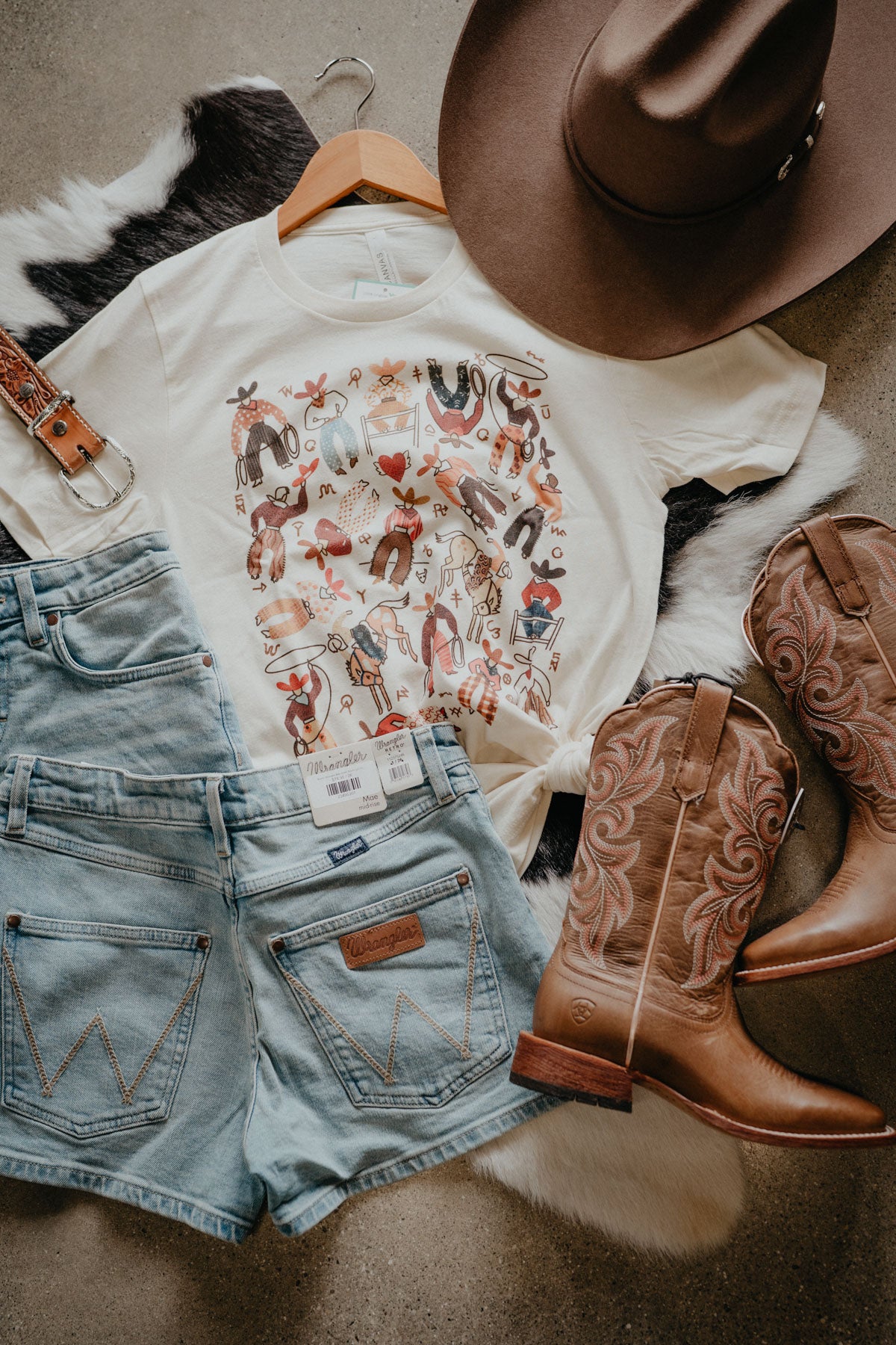 'Way Out West' Natural T-shirt by XOXO Art & Co (XS-XXL)