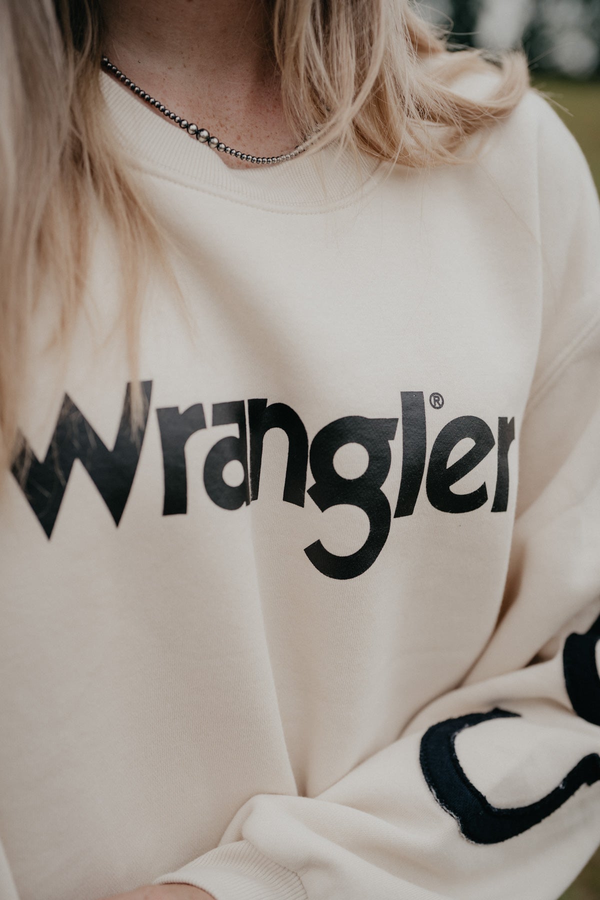 'Horseshoe Honey' Women's Wrangler Ivory Crewneck