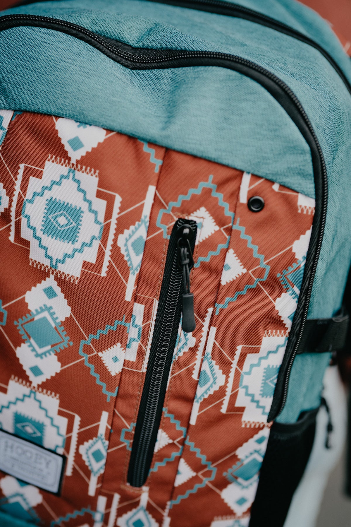 Rockstar Hooey Backpack Rust / Teal Aztec Print with Teal Accents